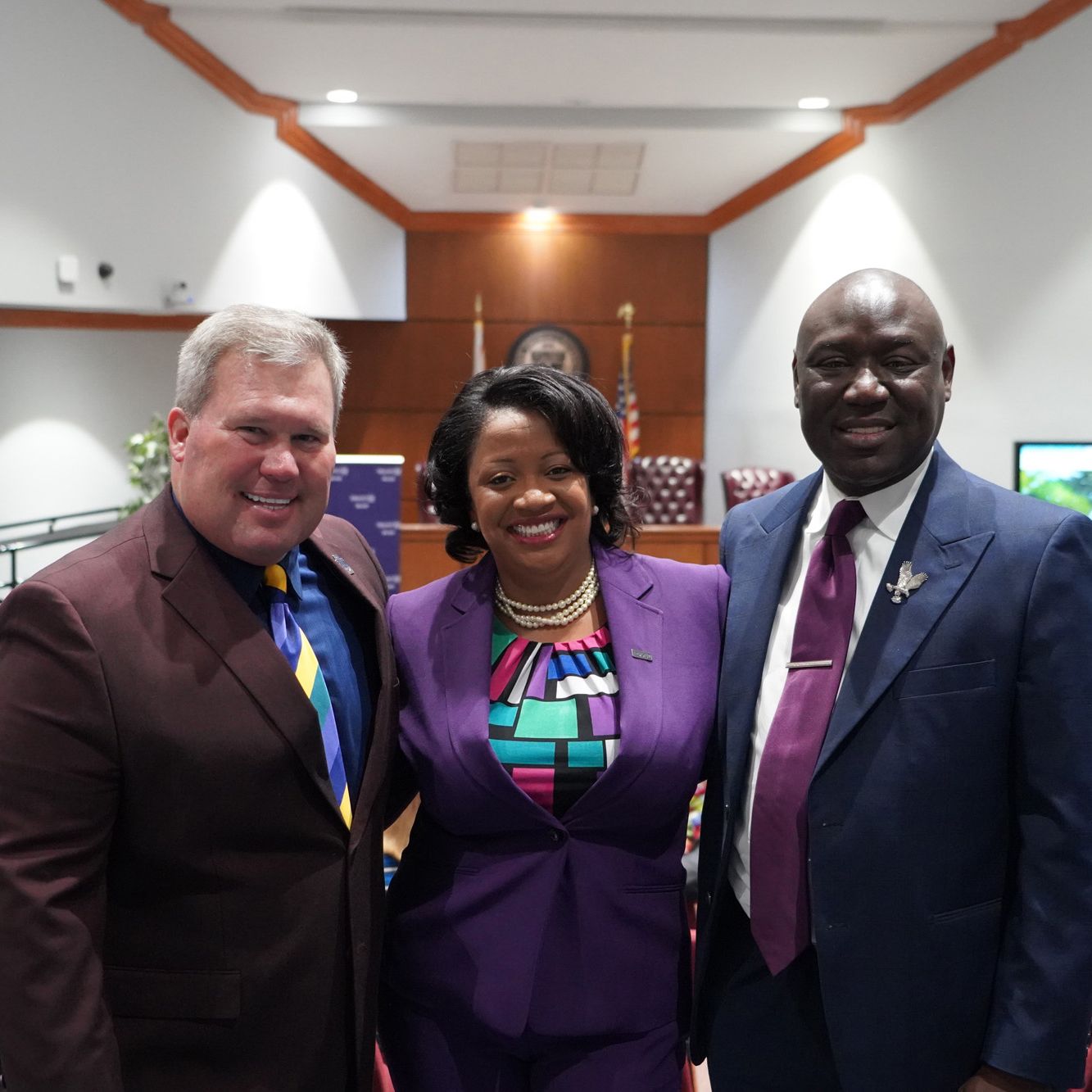 Benjamin Crump (right) with STU President David A. Armstrong, J.D. (left), and Truist Chief DE&I Officer  Cindy McSweeney (center)