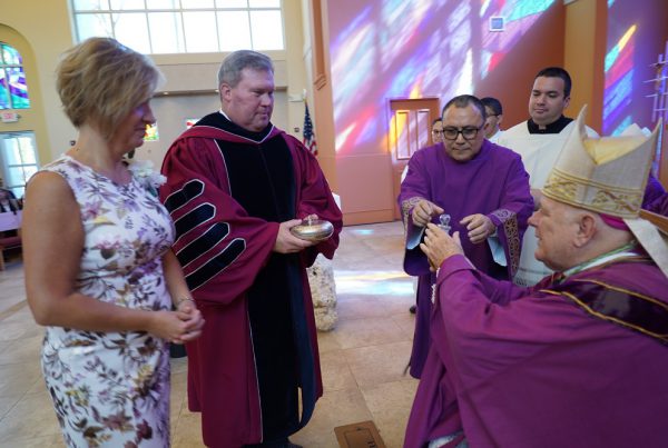 Dave with Archbishop Wenski and First Lady in the Inauguration Mass - 3/20/2019