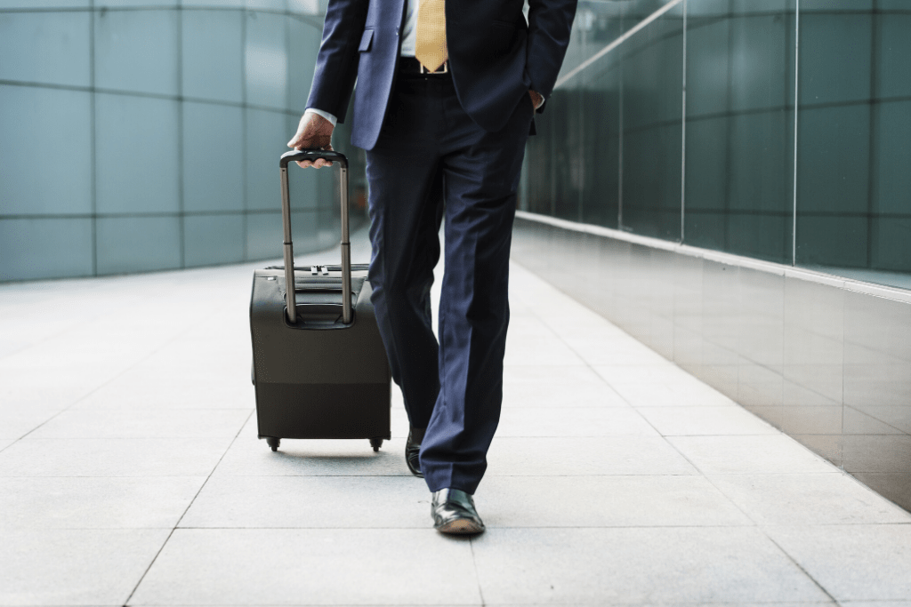 Businessman walking with a suitcase