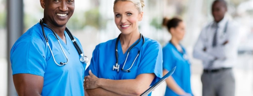 Nursing students smiling at the camera