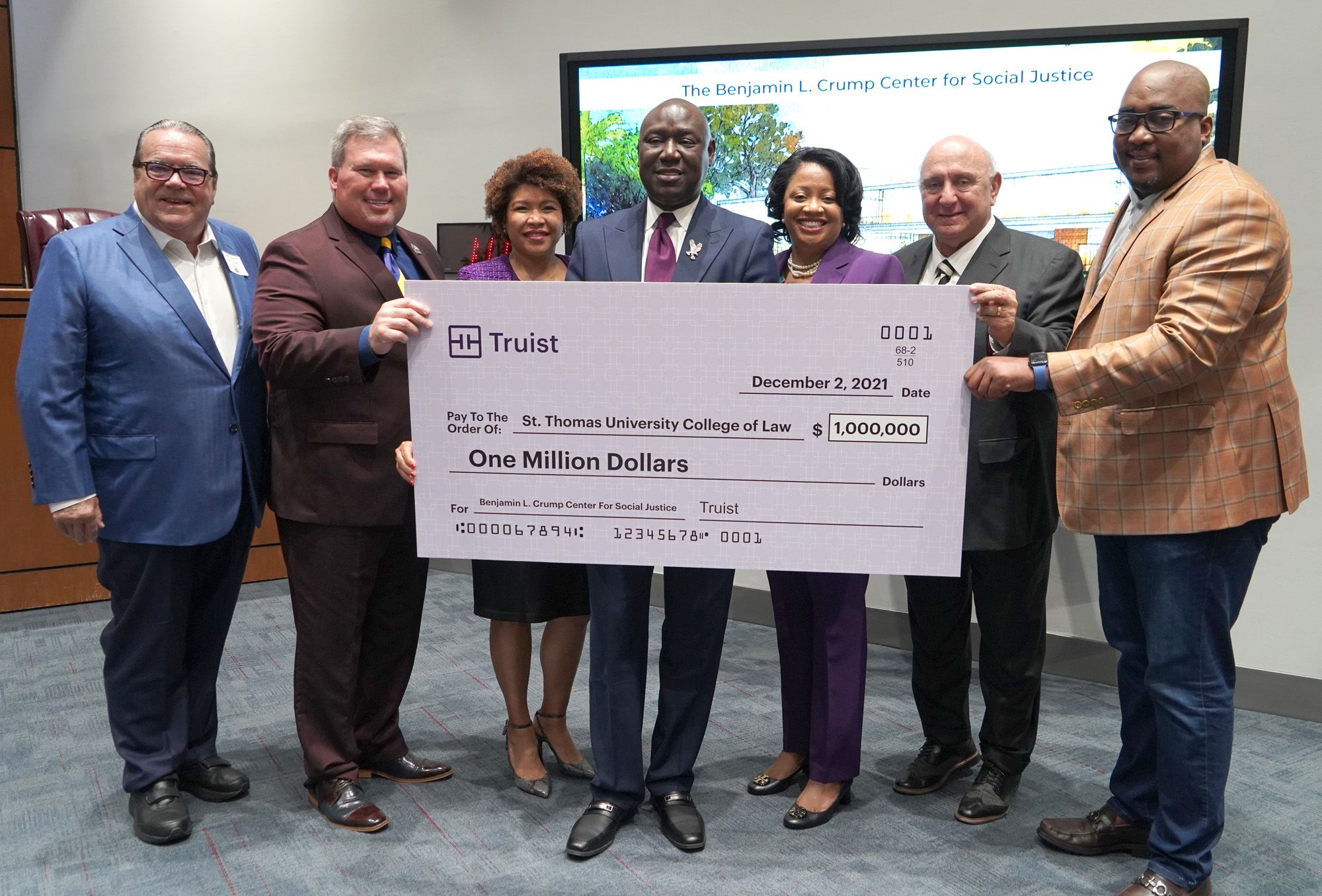 From left to right: STU Board of Trustees Chair John Dooner, STU President David A. Armstrong, J.D., STU College of Law Dean Tamara Lawson, Benjamin L. Crump, EVP at Truist Financial Wendy McSweeney, Herman Russomano, J.D., and Truist South Florida Regional President Tony Coley