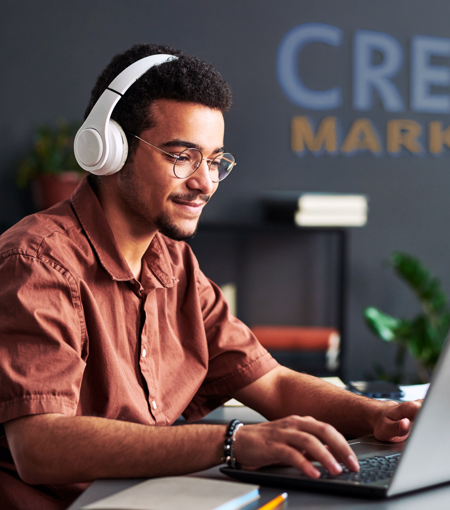 Young man working at creative marketing agency