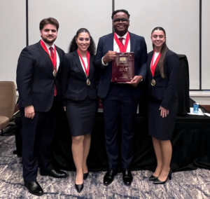 The St. Thomas University College of Law team of Juan Estevez, from the left, Frances Lissabet, Rhod Belizaire, and Nadia Bernal won the 2025 Florida Justice Association Earle Zehmer Memorial Mock Trial Competition in Orlando. The St. Thomas teams were coached by Professor Houston Lafrance, Karina Harduvel, Conor Sloan, Idan Livnat, and Ernesto Leo.