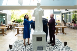 Dean Navarro and President Armstrong unveiling statue.
