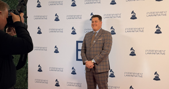 Justin Fisher being photographed