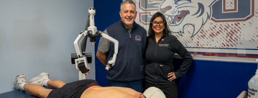 Franco and Tuffy with FX 635 laser treatment machine