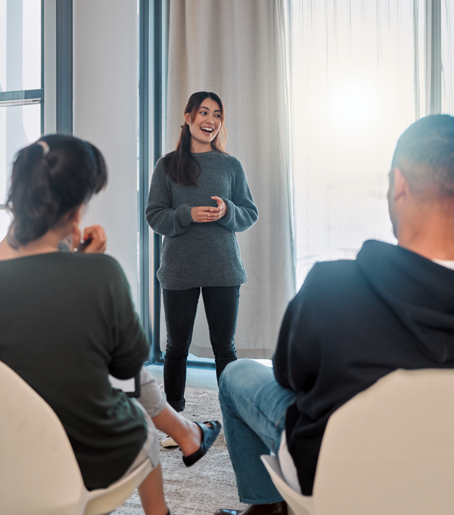 Psychologist speaking to group