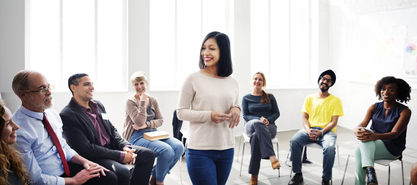 Female leader speaking to a room