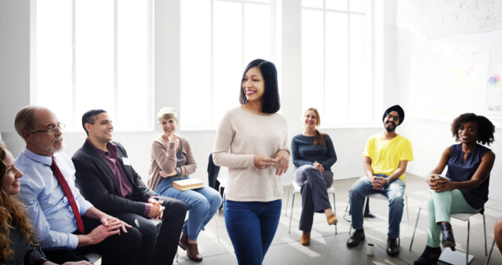 Female leader speaking to a room